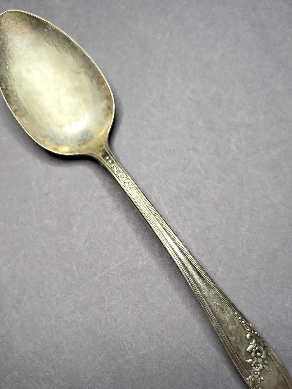 Oneida Silver Floral Handle Spoon